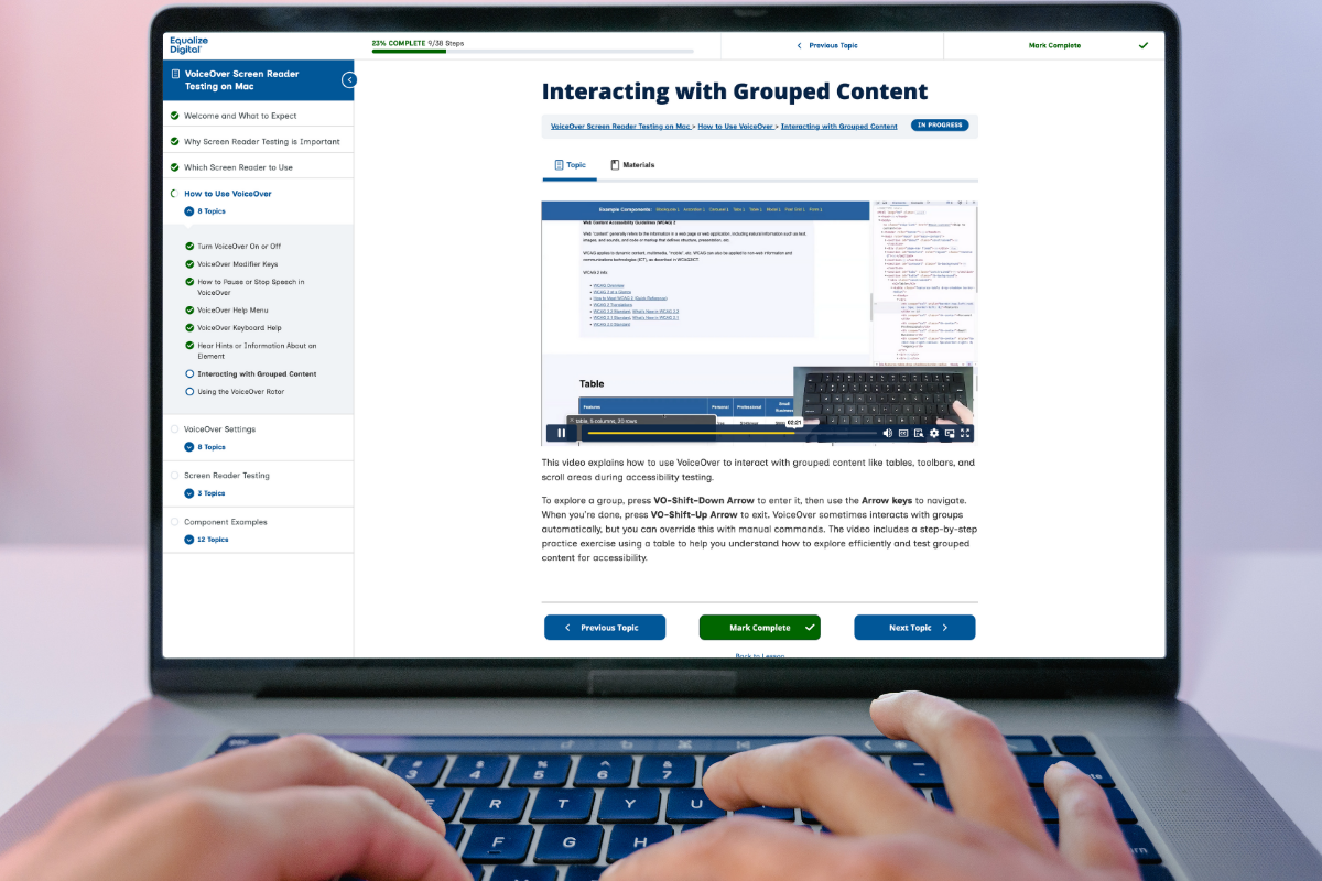 Closeup of a laptop showing the Grouped Content lesson in the VoiceOver course. Lesson navigation is on the left and course content is on the right with a video and written summary.