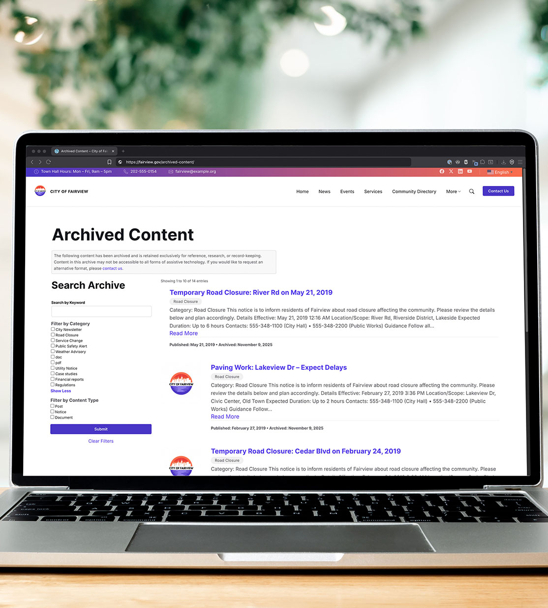 Laptop showing the ArchiveWP WordPress plugin with a filterable archive for storing legacy content on a website.